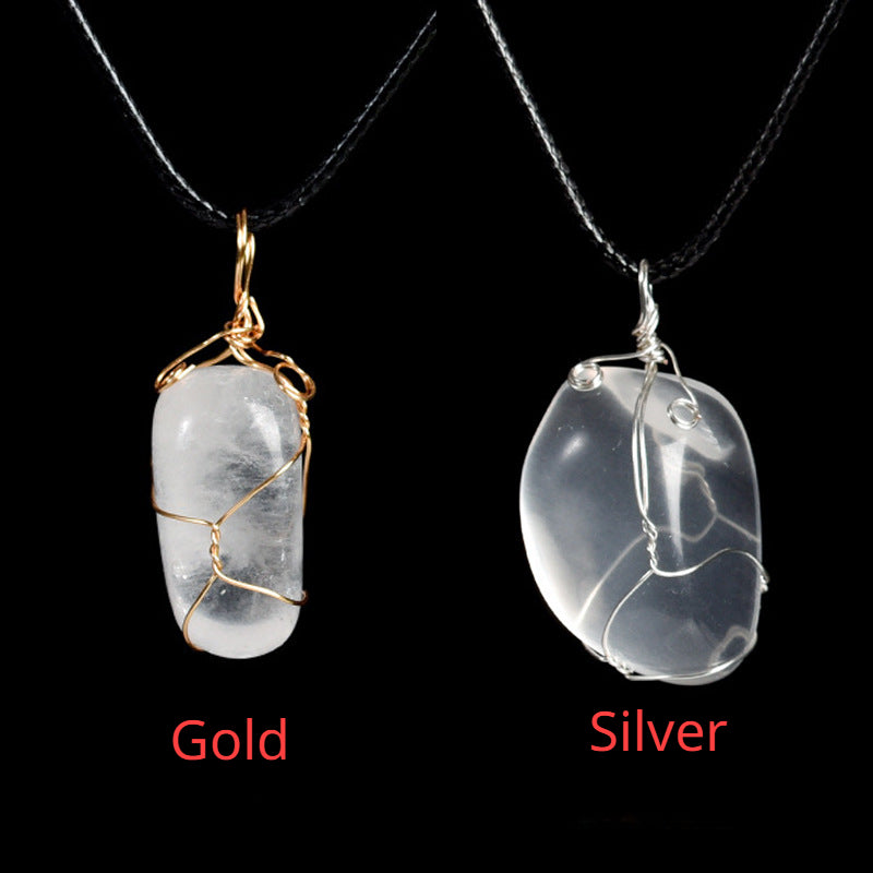 Raw crystal on coil pendant necklace