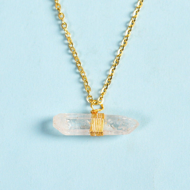 Raw clearn crystal wrapped in coil necklace